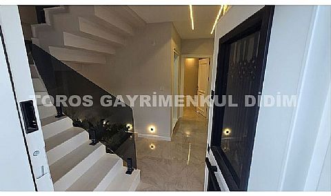 Didim akbükte 526 m2 arsa üzerine kurulu 4+1 müstakil satılık villa