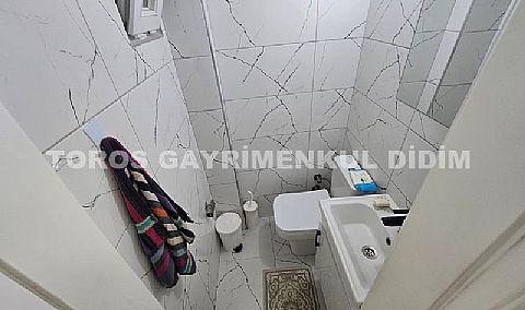Didim akbükte site içerisinde geniş bahçeli denize yakın konumda satılık yazlık villa