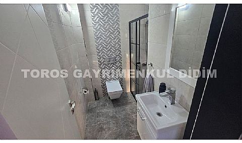 Didim Akbük’te Denize 1,200 m Mesafede Havuzlu Sitede  Satılık Villa