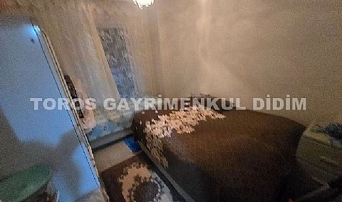 Didim Altınkum çamlıkta denize 150 mt mesafede satılık 2+1 yazlık  daire 