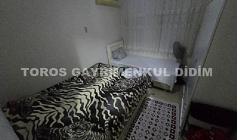Didim Altınkum çamlıkta denize 150 mt mesafede satılık 2+1 yazlık  daire 