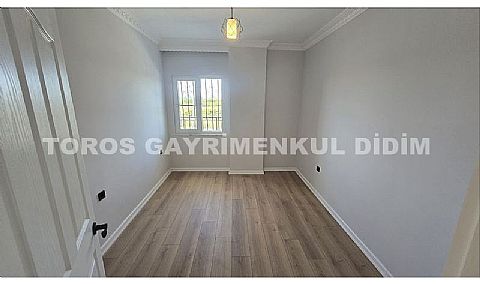 Didim altınkum çamlıkta denize 600 mt mesafede satılık daire