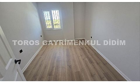 Didim altınkum çamlıkta denize 600 mt mesafede satılık daire