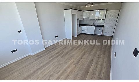 Didim altınkum çamlıkta denize 600 mt mesafede satılık daire