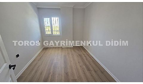 Didim altınkum çamlıkta denize 600 mt mesafede satılık daire