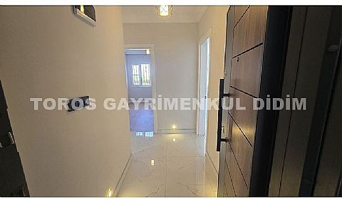 Didim altınkum çamlıkta denize 600 mt mesafede satılık daire