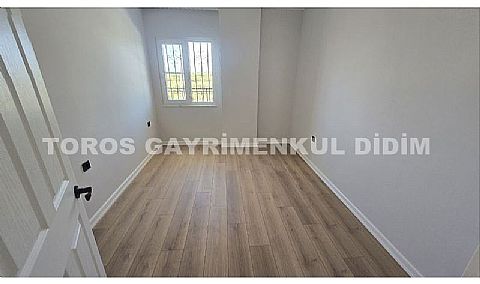 Didim altınkum çamlıkta denize 600 mt mesafede satılık daire