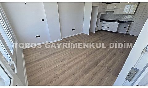 Didim altınkum çamlıkta denize 600 mt mesafede satılık daire