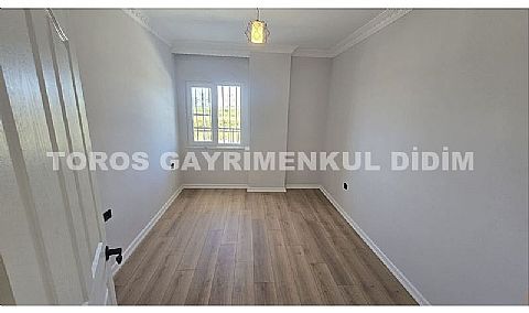Didim altınkum çamlıkta denize 600 mt mesafede satılık daire