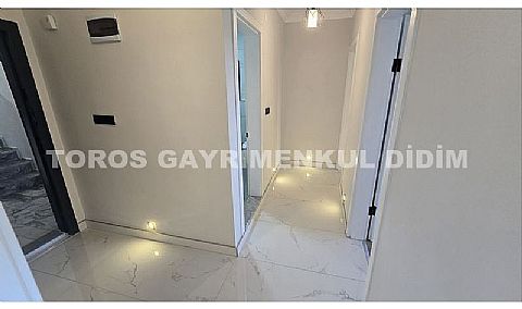 Didim altınkum çamlıkta denize 600 mt mesafede satılık daire