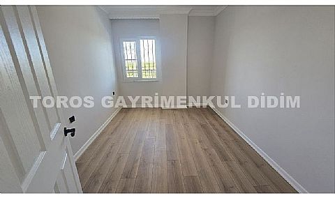 Didim altınkum çamlıkta denize 600 mt mesafede satılık daire