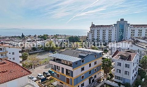 Didim altınkum çamlıkta plaja 300 mt mesafede asansörlü binada satılık dublex