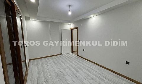 Didim altınkum çamlıkta plaja 300 mt mesafede asansörlü binada satılık dublex