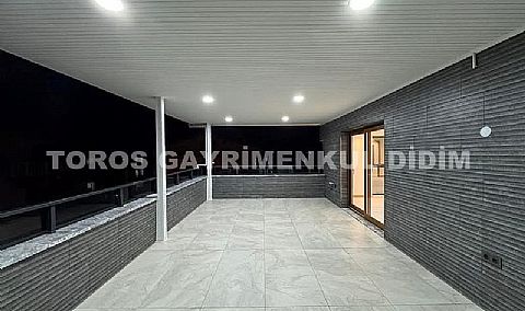 Didim altınkum çamlıkta plaja 300 mt mesafede asansörlü binada satılık dublex