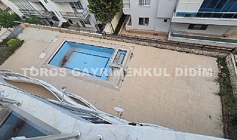 Didim Altınkum havuzlu sitede satılık 3+1  eşyalı geniş bakonlu orta kat daire