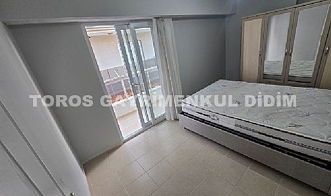 Didim Altınkum havuzlu sitede satılık 3+1  eşyalı geniş bakonlu orta kat daire