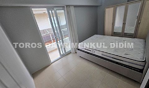 Didim Altınkum havuzlu sitede satılık 3+1  eşyalı geniş bakonlu orta kat daire