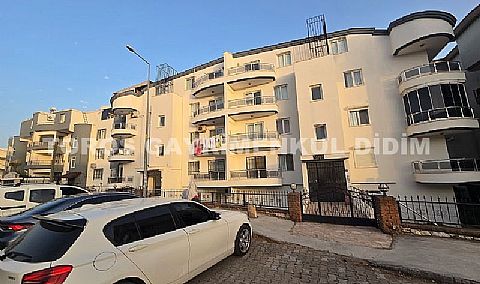 Didim Altınkum havuzlu sitede satılık 3+1  eşyalı geniş bakonlu orta kat daire