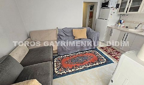 didim altınkum plaja 10 dakika yürüme mesafesinde satılık 1+1 daire