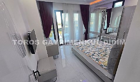 Didim altınkumda havuzlu güvenlikli sitede satılık eşyalı dubleks daire