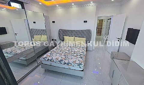 Didim altınkumda havuzlu güvenlikli sitede satılık eşyalı dubleks daire