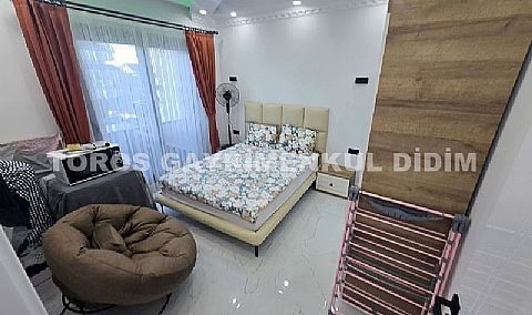 Didim altınkumda havuzlu güvenlikli sitede satılık eşyalı dubleks daire