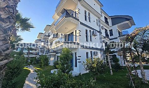 Didim altınkumda havuzlu güvenlikli sitede satılık eşyalı dubleks daire