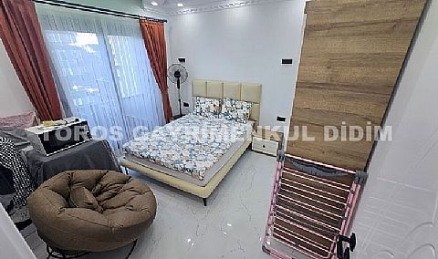 Didim altınkumda havuzlu güvenlikli sitede satılık eşyalı dubleks daire