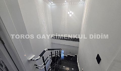 Didim altınkumda havuzlu güvenlikli sitede satılık eşyalı dubleks daire