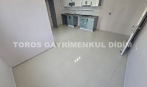 Didim altınkumda plaja 400 mt mesafede satılık 2+1 orta daire