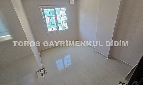 Didim altınkumda plaja 400 mt mesafede satılık 2+1 orta daire