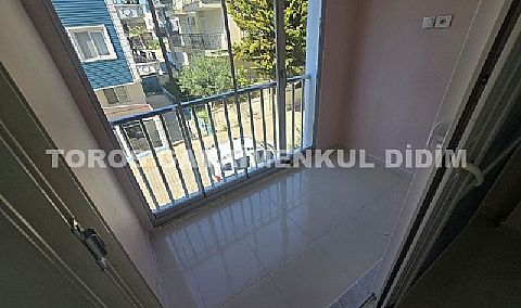 Didim altınkumda plaja 400 mt mesafede satılık 2+1 orta daire