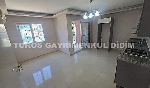 Didim altınkumda plaja 400 mt mesafede satılık 2+1 orta daire