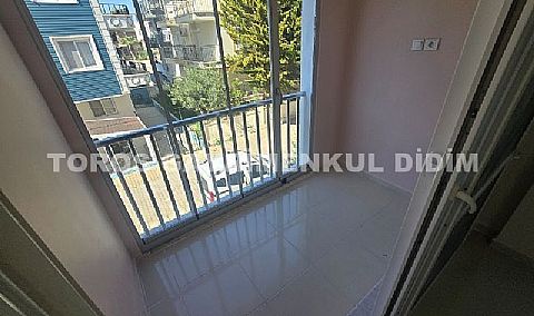 Didim altınkumda plaja 400 mt mesafede satılık 2+1 orta daire