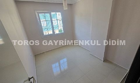 Didim altınkumda plaja 400 mt mesafede satılık 2+1 orta daire