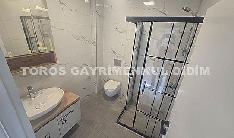 didim çamlıkta denize 400 mt mesafede satılık 1+1 daire