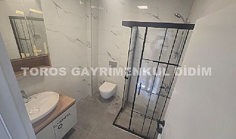 didim çamlıkta denize 400 mt mesafede satılık 1+1 daire