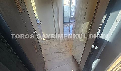 didim çamlıkta denize 400 mt mesafede satılık 1+1 daire