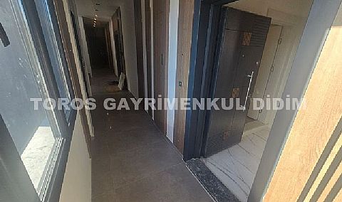 didim çamlıkta denize 400 mt mesafede satılık 1+1 daire