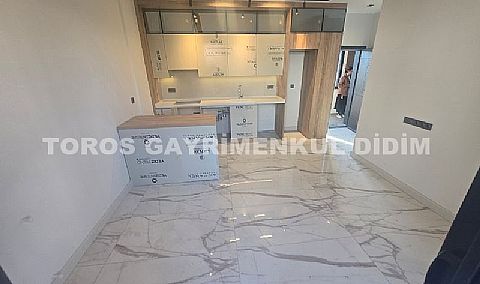 didim çamlıkta denize 400 mt mesafede satılık 1+1 daire