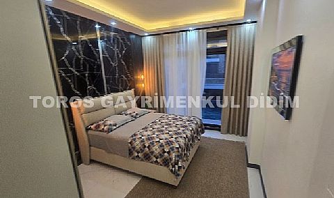 Didim Çamlık`ta Havuzlu Eşyalı Satılık Lüks Sıfır Villa