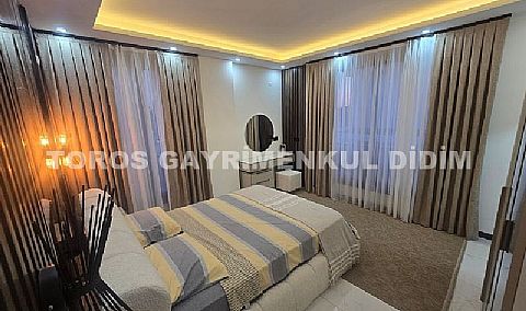 Didim Çamlık`ta Havuzlu Eşyalı Satılık Lüks Sıfır Villa