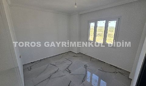 Didim cumhuriyet mahallesinde Asansörlü Binada satılık 2+1 daire 