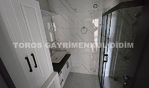 Didim cumhuriyet mahallesinde havuzlu sitede satılık orta kat daire