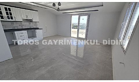 Didim efelerde asansörlü binada satılık kat dubleksi