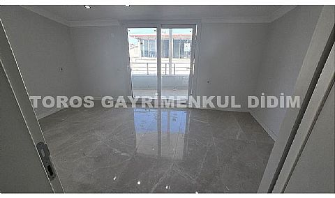 Didim efelerde asansörlü binada satılık kat dubleksi