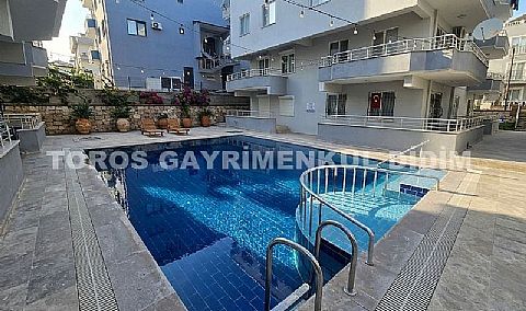 Didim efelerde havuzlu sitede satılık 2+1 eşyalı daire