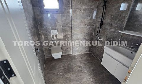 Didim Fevzi paşa mahallesinde plaja 1.200 mt mesafede satılık tam müstakil villa