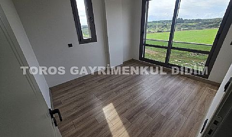 Didim Fevzi paşa mahallesinde plaja 1.200 mt mesafede satılık tam müstakil villa