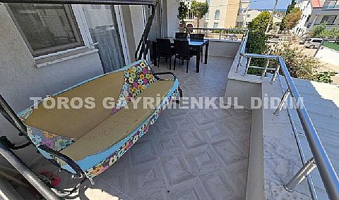 Didim Hisar Mahallesi'nde Yaz-Kış Oturuma Uygun, 95 m² Genişliğinde Kısmi Ayrı Mutfaklı satılık 2+1